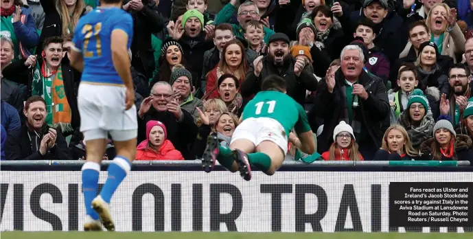  ??  ?? Fans react as Ulster and Ireland’s Jacob Stockdale scores a try against Italy in the Aviva Stadium at Lansdowne Road on Saturday. Photo: Reuters / Russell Cheyne