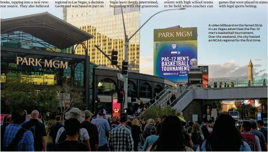  ?? ?? A video billboard on the famed Strip in Las Vegas advertises the Pac-12 men’s basketball tournament. Over the weekend, the city hosted an NCAA regional for the first time.