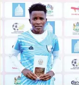  ??  ?? ON FIRE: Radiakanyo with her Player of the Match award after her brace against LDF