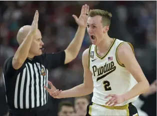  ?? AP PHOTO/DAVID J. PHILLIP ?? Purdue guard Fletcher Loyer (2) celebrates after scoring against North Carolina State during the second half of the NCAA college basketball game at the Final Four, Saturday, April 6, 2024, in Glendale, Ariz.