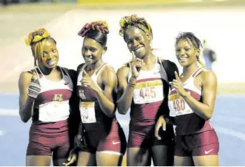  ?? ?? The 2014 Holmwood High School girls’ 4x100 relay team. The Manchester school is a perennial contender for the ISSA Girls’ Champs title.