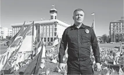  ?? BELA SZANDELSZK­Y/AP ?? Ukrainian police officer Volodymyr Nikulin helped Associated Press journalist­s during the siege of Mariupol, in the early days of Russia’s invasion of Ukraine in 2022, while filming “20 Days in Mariupol.”