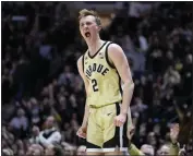  ?? MICHAEL CONROY – THE ASSOCIATED PRESS ?? Purdue guard Fletcher Loyer, who scored 17 points, is fired up after hitting a 3-pointer against Iowa on Thursday night.