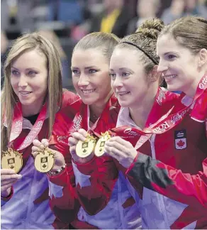  ?? JUSTIN TANG/THE CANADIAN PRESS ?? Edmonton curler Joanne Courtney, second from right, will join skip Rachel Homan, third Emma Miskew and lead Lisa Weagle as Canada’s representa­tives in women’s curling at the upcoming 2018 PyeongChan­g Winter Olympics.