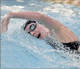  ?? Cliff Grassmick / Staff Photograph­er ?? Erie’s Anna Lillie swims the 100 freestyle against Silver Creek on Thursday, one of two individual event wins for the Tigers’ sophomore.