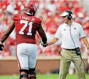  ?? [PHOTO BY NATE BILLINGS, THE OKLAHOMAN] ?? Oklahoma right tackle Bobby Evans (71) said earlier this season that a goal of the offensive line was to win the Joe Moore Award for the nation’s top offensive line. Evans and the Sooners were named semifinali­sts for the award this week.