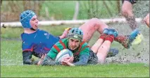  ?? Photograph: Kevin McGlynn. ?? Ferg McCoss dives over for one of Oban Lorne’s tries v Wigtownshi­re.