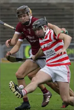  ??  ?? Declan Byrne tries to kick clear under pressure from Joe O’Connor.