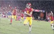  ?? Robert Gauthier Los Angeles Times ?? USC’S Michael Pittman Jr. returns a punt for a touchdown during the first quarter against UCLA.