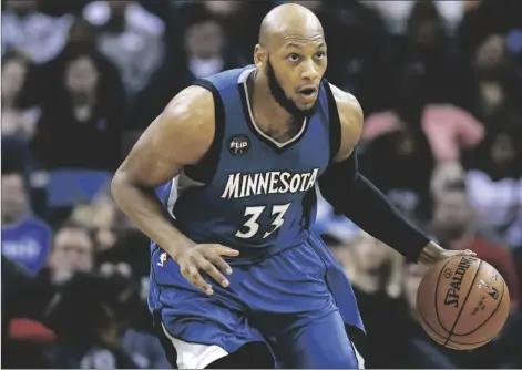  ?? AP PHOTO/JONATHAN BACHMAN ?? Minnesota Timberwolv­es forward Adreian Payne (33) drives with the ball during the second half of an NBA basketball game, on 2016 in New Orleans.