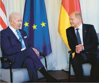  ?? SUSAN WALSH/AP ?? President Joe Biden and German Chancellor Olaf Scholz focus on Ukraine during the opening Sunday of the G-7 summit in Elmau, Germany.