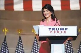  ?? Susan Walsh Associated Press ?? NIKKI HALEY, a former U.N. envoy, generally avoided the convention’s dark rhetoric, describing her upbringing as “a brown girl in a black and white world.”