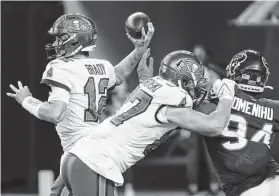  ?? Brett Coomer / Staff photograph­er ?? Buccaneers quarterbac­k Tom Brady, seeing his first action of the preseason, was 11-of-14 passing for 154 yards and a TD in the first half Saturday at NRG Stadium.