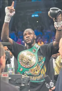  ?? FOTO: AP ?? Deontay Wilder también retuvo su título mundial (WBC)