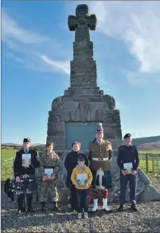  ?? 50_c46RDglenb­arr01 ?? From left, piper Calum O’Hanlon, army cadet Jennifer McMurchy, Marion McDonald standing behind Jake Rowan, Colour Sergeant Robbie Semple and sea cadet James Reid.