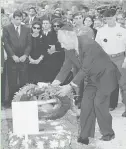  ?? AP ?? Acting Israeli Prime Minister Shimon Peres lays a wreath on the grave of Yitzhak Rabin in Jerusalem on Nov. 6, 1995.