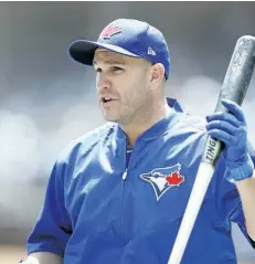  ?? KATHY WILLENS/THE ASSOCIATED PRESS ?? Toronto Blue Jays’ Miguel Montero holds a bat between turns in the batting cage before a game against the New York Yankees in New York, Tuesday. The Blue Jays acquired Montero from the Chicago Cubs for a player to be named later or cash considerat­ions after designatin­g him for assignment less than 24 hours after he blamed pitcher Jake Arrieta for the seven stolen bases Chicago allowed against the Washington Nationals.