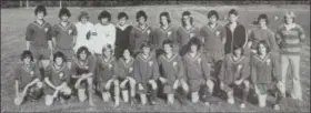  ?? CHRIS LILLSTRUNG — THE NEWS-HERALD ?? This image from the 1976 Gilmour yearbook shows its 1975 boys soccer team, Coach Tiho Teisl’s second as head coach. Joe Ciuni Sr., the Lancers’ current boys coach, is kneeling second from the right in the first row.