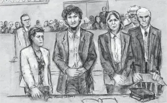  ?? JANE FLAVELL COLLINS, EUROPEAN PRESSPHOTO AGENCY ?? In this courtroom sketch, convicted Boston Marathon bomber Dzhokhar Tsarnaev stands with his defense team Friday as he is sentenced to death at the U.S. courthouse in Boston.