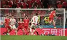  ??  ?? Andreas Christense­n fires in Denmark’s third goal. Photograph: Jonathan Nackstrand/AFP/Getty Images