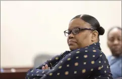  ?? PHOTO BY ANDREW FOULK ?? Candace Tai Townsel, left, sits with co-defendant Kimesha Monae Williams, back right, during opening statements Jan. 11at their trial in the robbery and death of 84-year-old Afaf Assad of Long Beach at the Pechanga Resort Casino.