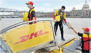  ?? PHOTO: DHL ?? DHL boat on River Thames replaces transfers via trucks.