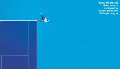  ??  ?? ‘End of the line’. This drone shot of a tennis court by Martin Sanchez won the People category