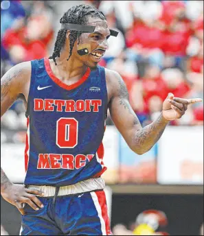 ?? David Dermer The Associated Press ?? Detroit Mercy guard Antoine Davis led the nation at 28.2 points per game this season and with 159 made 3-pointers.