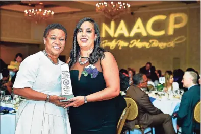  ?? Catherine Avalone / Journal Register Co. ?? Doris J. Dumas, president of the New Haven NAACP, right, presents the Cornell Scott Health Award to Ena Williams at the 98th annual Freedom Fund Dinner, at the Omni at Yale in 2015.