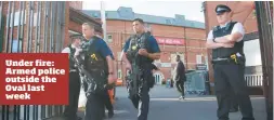  ??  ?? Under fire: Armed police outside the Oval last week