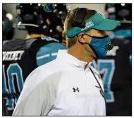  ?? (AP/Richard Shiro) ?? Coach Jamey Caldwell and No. 12 Coastal Carolina were scheduled to face No. 19 Louisiana-Lafayette for the Sun Belt Conference championsh­ip Saturday, but the game was canceled Thursday evening because of a positive covid-19 case within the Chanticlee­rs’ program.