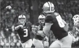  ?? ASSOCIATED PRESS ?? WASHINGTON QUARTERBAC­K Jake Browning (3) passes to tight end Drew Sample (right) for a touchdown against Brigham Young during the second half of a game, Saturday in Seattle.