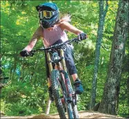  ?? Contribute­d photo ?? Lindsey Runkel, a registered nurse at Yale New Haven Hospital, still rides a mountain bike after being injured in a biking accident in 2014.