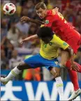  ?? AP PHOTO/ANDRE PENNER ?? Belgium's Jan Vertonghen, top and Brazil's Willian battle for the ball during the quarterfin­al match between Brazil and Belgium at the 2018 soccer World Cup in the Kazan Arena, in Kazan, Russia, Friday.