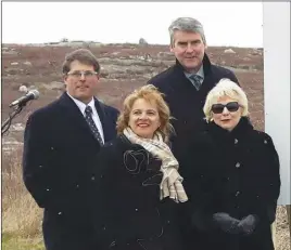  ?? CP PHOTO ?? Nova Scotia Premier Stephen McNeil (back) and supporters pose in Halifax yesterday after announcing a new QEII outpatient clinic.