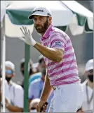  ?? CURTIS COMPTON / ATLANTA JOURNAL-CONSTITUTI­ON ?? Defending Masters champion Dustin Johnson shot a first-round 74. It was the first time since the opening round in 2018 that Johnson failed to break par.