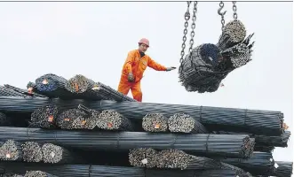  ?? AFP/ GETTY IMAGES FILES ?? A worker at a steel factory in Qingdao, China. G20 leaders are debating the divisive issue of steel as U.S. penalties could have a ripple effect on trading partners. Canada is seen as an unlikely target.