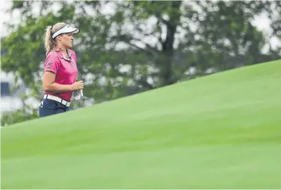  ?? DARRON CUMMINGS THE ASSOCIATED PRESS ?? Brooke Henderson’s putter was hot at last week’s LPGA Tour stop in Indianapol­is. She finished tied for seventh.