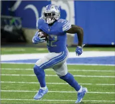  ?? DUANE BURLESON — THE ASSOCIATED PRESS ?? Detroit Lions running back D’Andre Swift (32)) runs the ball against the Washington during the second half of Sunday’s game in Detroit.