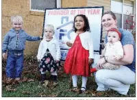  ?? U.S. AIR FORCE PHOTO BY STAFF SGT. DANA J. CABLE ?? Malissa Kaye, a family child care provider, poses for a photo in front of her home Nov. 30 at the Little Rock Air Force Base. Kaye was selected as the 2017 Little Rock Air Force Base Family Child Care Provider and cares for up to six children each day...