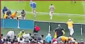  ??  ?? FATAL SHOT:New footage, from the left frame, shows the policeman, pictured top left, tripping while a security officer approaches from the field. The policeman rises, engages the fan and pushes him in the presence of the security officer after which a...