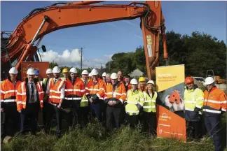  ??  ?? Minister Eoghan Murphy turns the sod on the new housing developmen­t ‘Avondale Heights’ in Rathdrum.