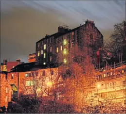  ??  ?? Dean Village from the bridge across the Water of Leith, Edinburgh