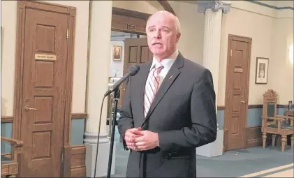  ?? ASHLEY FITZPATRIC­K/THE TELEGRAM ?? Finance Minister Tom Osborne speaks to reporters Monday outside the House of Assembly.