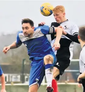  ?? Picture: Haydn Jones ?? Cribbs captain Jake Hodgson, left, seen here challengin­g Shepton Mallet’s Aaron Cockerill for the ball, will miss tomorrow’s Toolstatio­n League game at Pplymouth Parkway through injury