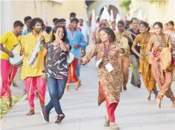  ?? PTI ?? Activists dance during the ‘ Baatein Aman Ki’ campaign that aims to sensitise people about violence against women, in Bengaluru on Thursday. —