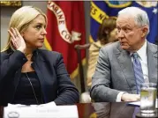  ?? EVAN VUCCI / AP ?? U.S. Attorney General Jeff Sessions (right) talks with Florida Attorney General Pam Bondi before a meeting on school safety Thursday at the White House.