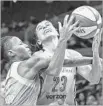  ?? Ringo H.W. Chiu Associated Press ?? SPARKS guard Ana Dabovic is fouled by Jamierra Faulkner.