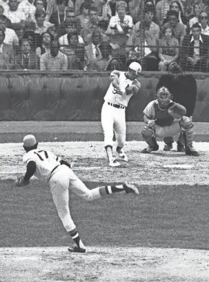  ?? AP FILE ?? Athletics slugger Reggie Jackson hits a two-run home run off Pirates pitcher Dock Ellis in the third inning in the All-Star Game on July 13, 1971 at Tiger Stadium.