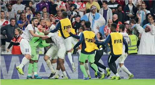  ?? Photo by Ryan Lim ?? Al Ain players celebrate after defeating River Plate via a penalty shootout in the semifinals of the Fifa Club World Cup on Tuesday. —